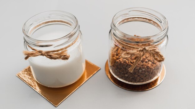 homemade vegan milk. buckwheat in glass jar, alternative dairy product. eco-friendly food.