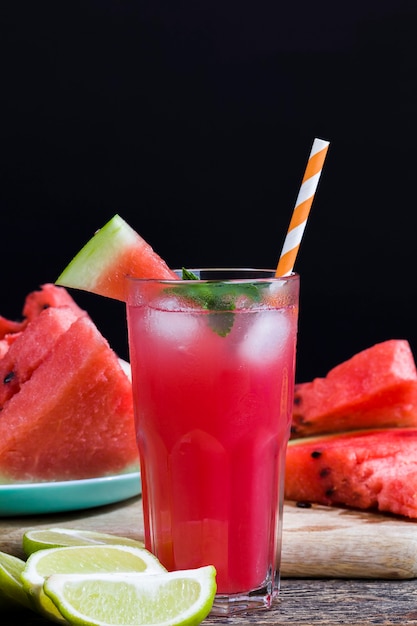 Homemade watermelon juice made in the summer or autumn season\
from ripe red and juicy watermelons red juice without added sugar a\
natural healthy and dietary product