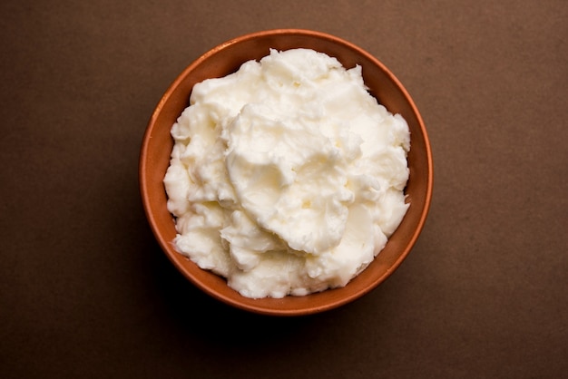 Homemade white Butter or Makhan or Makkhan in Hindi, served in a bowl. selective focus