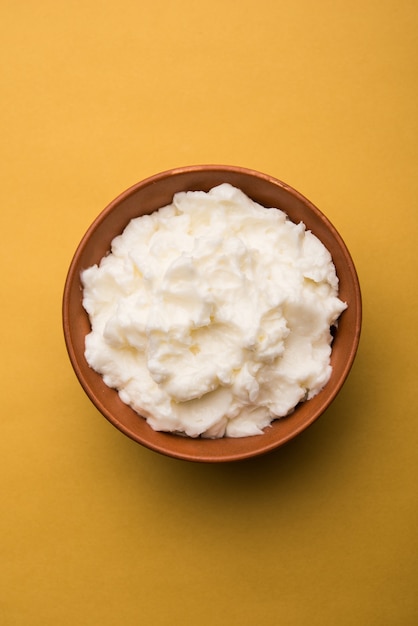 Homemade white Butter or Makhan or Makkhan in Hindi, served in a bowl. selective focus