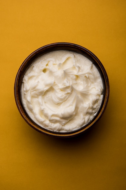 Homemade white Butter or Makhan or Makkhan in Hindi, served in a bowl. selective focus