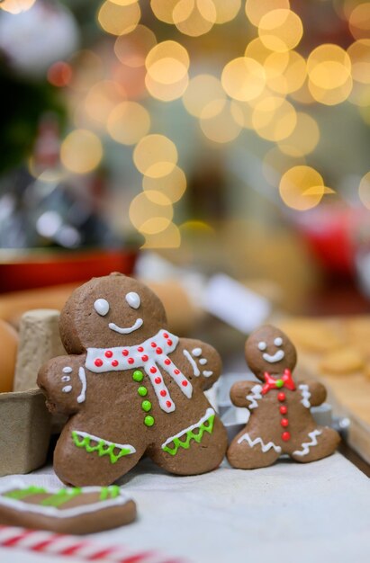 Homemade Xmas cookie for Christmas and Happy New Year. Cooking gingerbread with friend and Family on winter holiday at home.