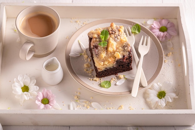 Homemade yeast cake made of chocolate and icing