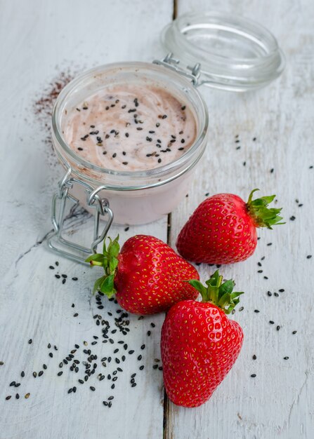 Homemade yogurt in a jar with strawberry