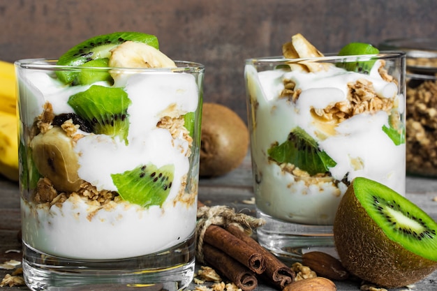 Homemade yogurt parfait with fruits, nuts and spices