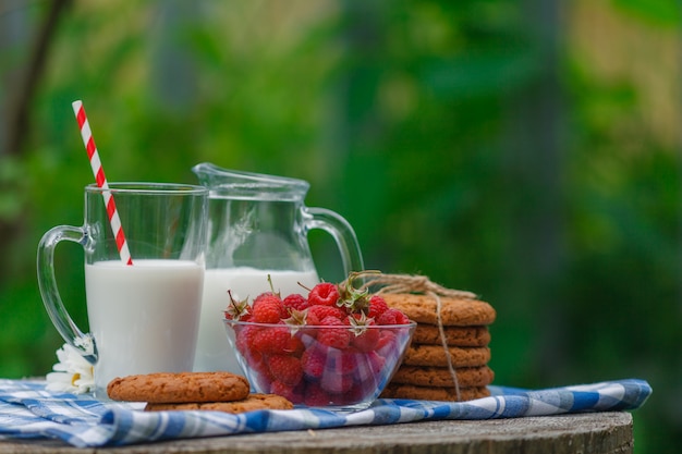 Homemade yogurt with fresh berries on the wooden table