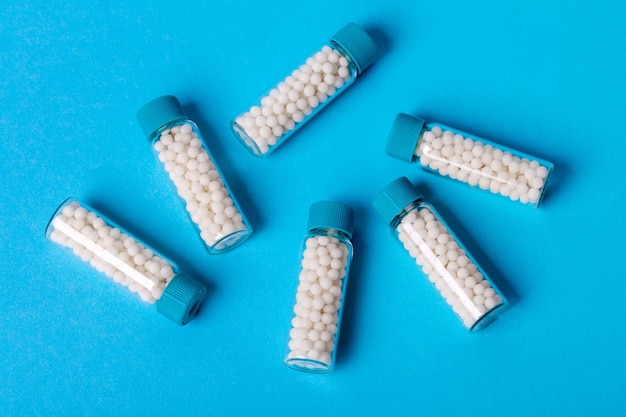 Homeopathiec geneeskunde Een homeopathie concept met homeopathische pillenxA