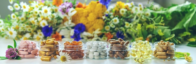 Homeopathy and dietary supplements from medicinal herbs Selective focus