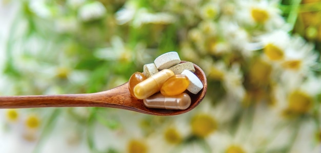 Homeopathy and dietary supplements from medicinal herbs Selective focus