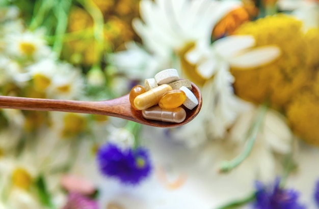 Homeopathy and dietary supplements from medicinal herbs Selective focus
