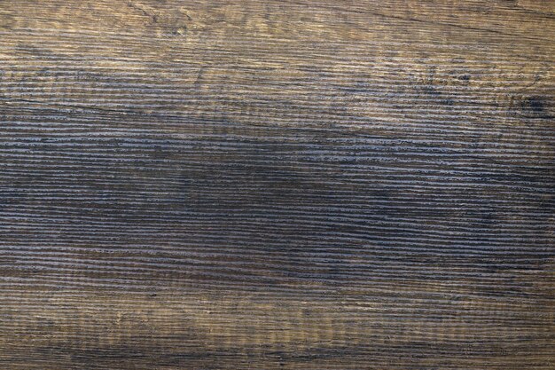 Homogene achtergrond die een houten oppervlak imiteert Homogene vlakke achtergrond die houtstructuur imiteert