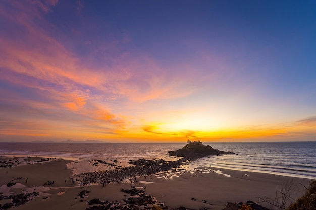 Hon Ba temple Vietnamese language is Mieu Hon Ba is a small pagoda in island in Vung Tau City Vietnam People walking in rock to visit temple in middle of month Background and travel concept