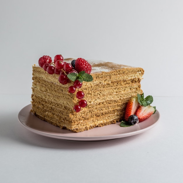 Honey cake with strawberries