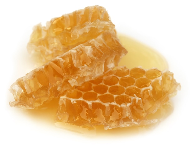 Honey comb over white background