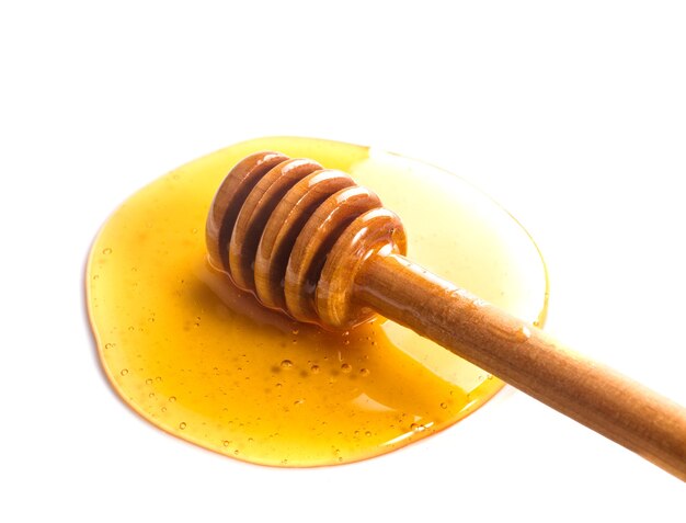 Honey drip isolated on white background