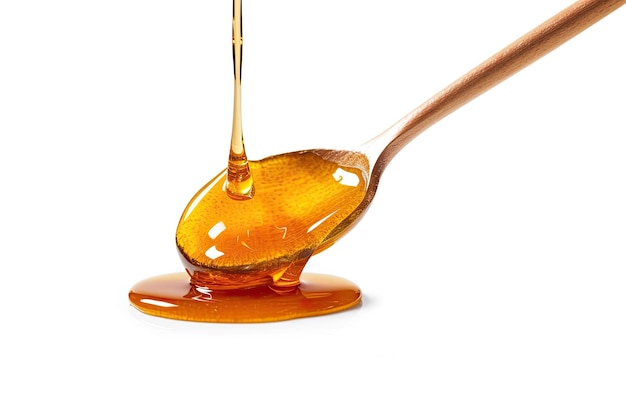 Honey Dripping From A Spoon On White Background