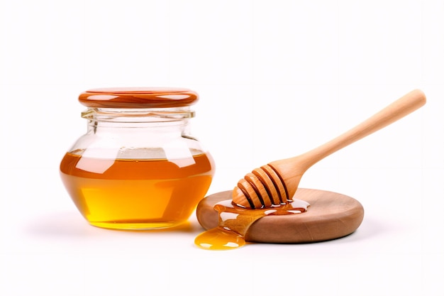 Honey jars honeycombs and honey spoon on white isolated background