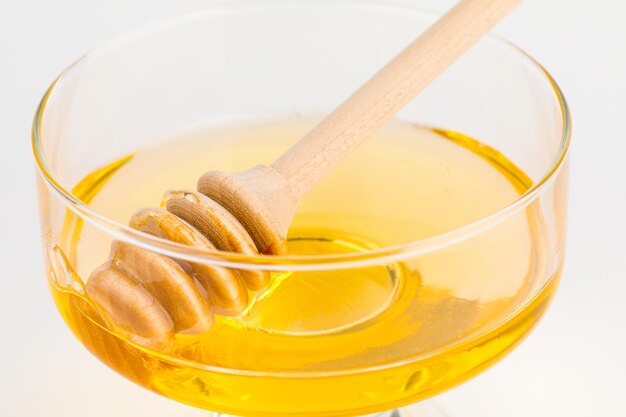 Honey ladle Honey tidbit in a glass jar