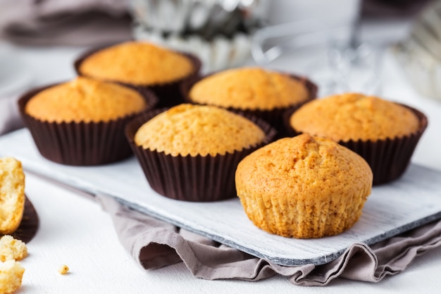 Honey muffins on a wooden board