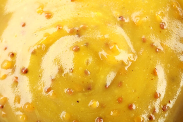 Honey mustard sauce on whole background close up