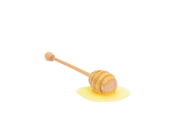 Honey stick isolate in honey drop in horizontal position