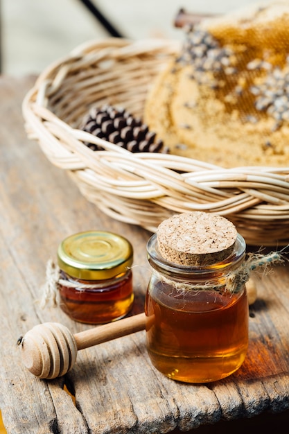 honey with honeycomb in the basket 