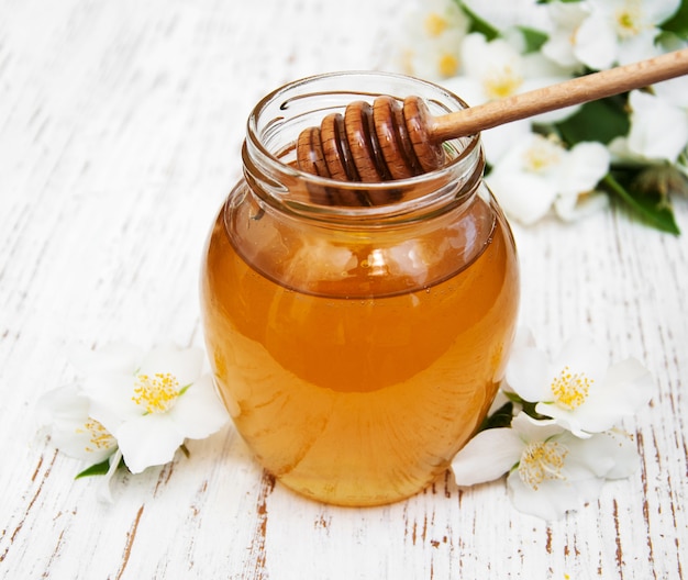 Honey with jasmine flowers