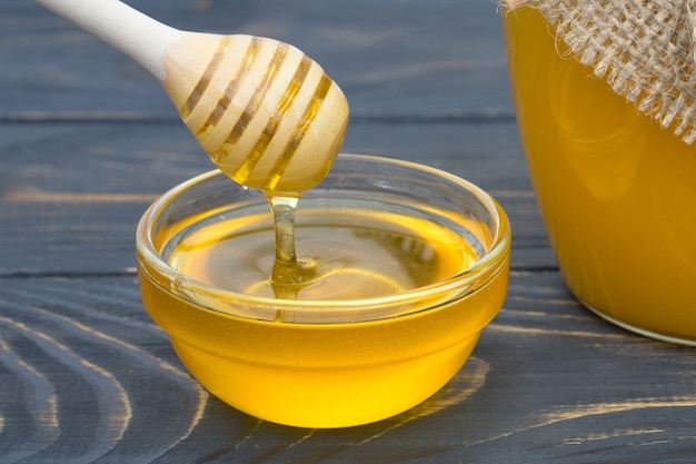 honey with wooden spoon