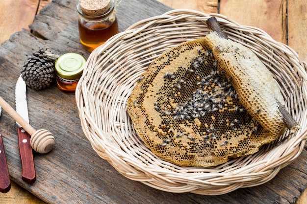 honeycomb in the basket on wooden table