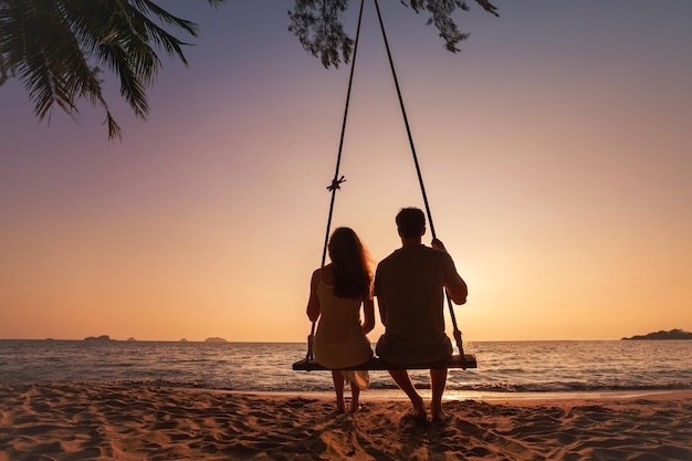 honeymoon travel silhouette of romantic couple on sunset beach tropical holidays near the sea man and woman together on vacation