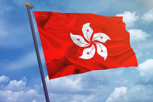 空の背景に香港の旗