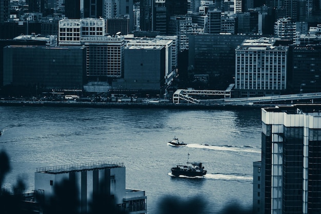 Hong Kong harbor with landscape view of city skyscraper skyline building China business landmark