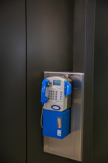 Hong Kong - March 17, 2016Payphone in Hong Kong airport