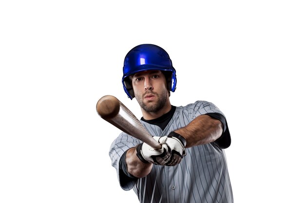 Honkbalspeler in een blauw uniform