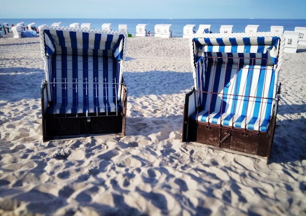 Hooded chairs on beach