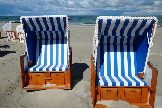 Hooded chairs on beach