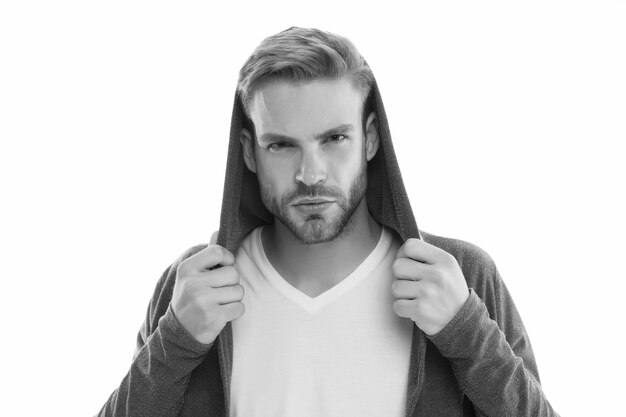 Hooded and unshaven Unshaven guy isolated on white Unshaven look of young model Handsome man with unshaven face Barbershop Hair salon Mens grooming habit Young skin Skincare