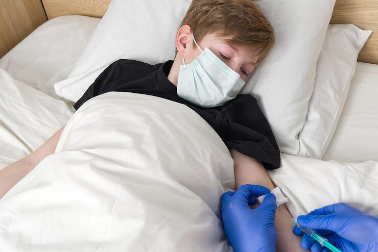 Foto hooghoekbeeld van de baby die op het bed slaapt
