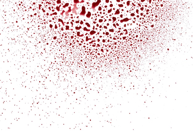 Hooghoekbeeld van rode verfvlekken op een witte achtergrond