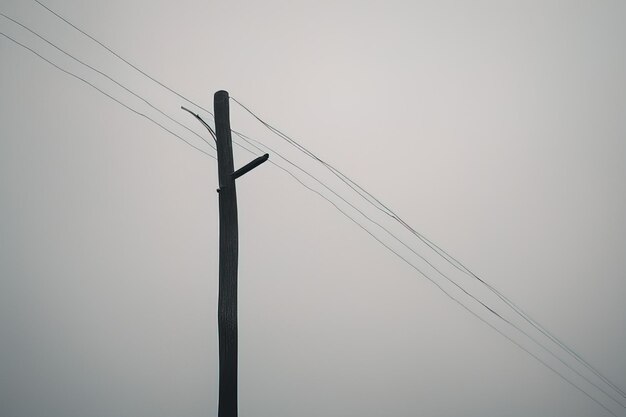 Foto hoogspanningsmast tegen de hemel elektriciteitsmast tegen de hoogspanningspost elektriciteitsnet