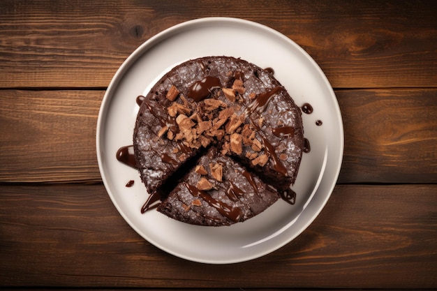 Foto hoogste mening van een houten achtergrond met chocolade browniecake met ganache