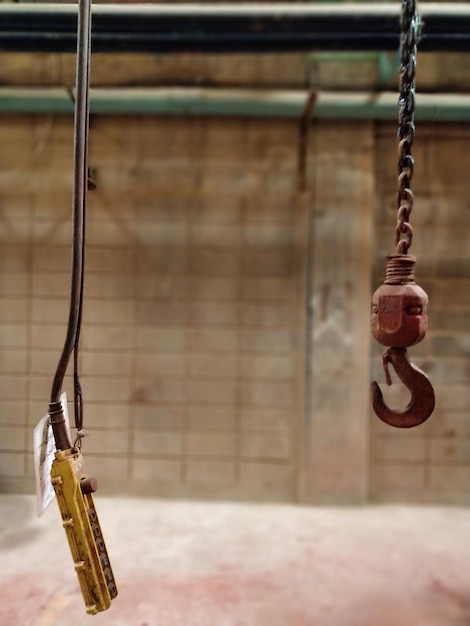 Photo hook with cables hanging in factory