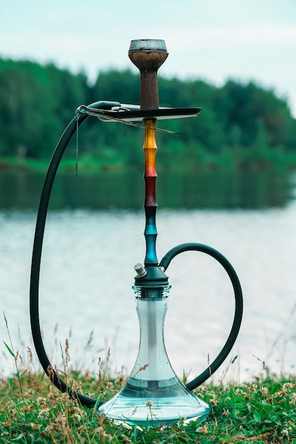 Hookah on the river bank vertical photo