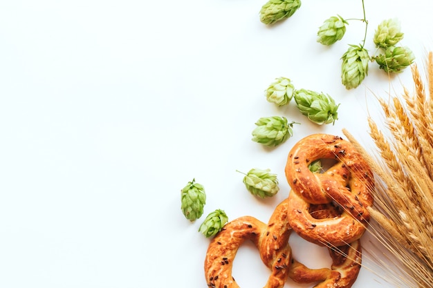 hop cones and pretzels on white