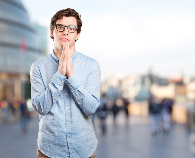 Hopeful young man praying