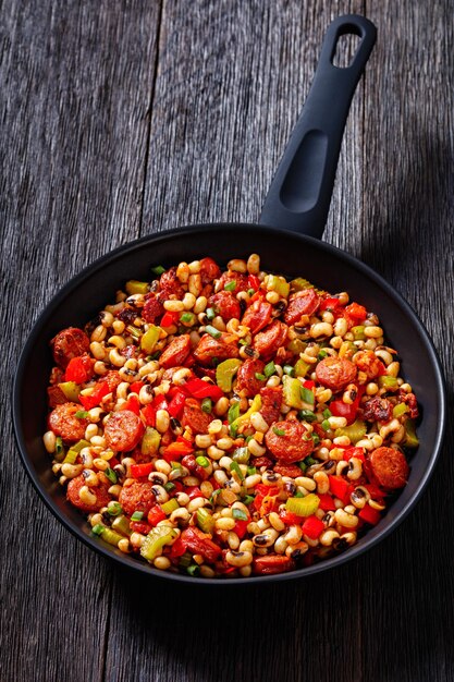 Hoppin John of blackeyed peas veggies sausages