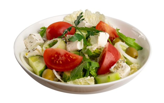 Horiatiki salad in white bowl isolated with clipping path