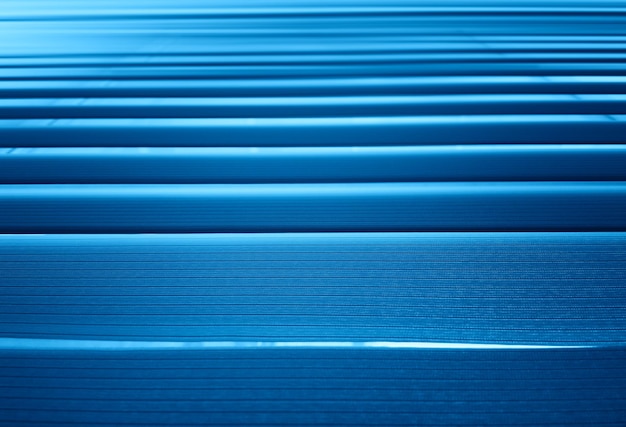 Horizontal blue office blinds bokeh background