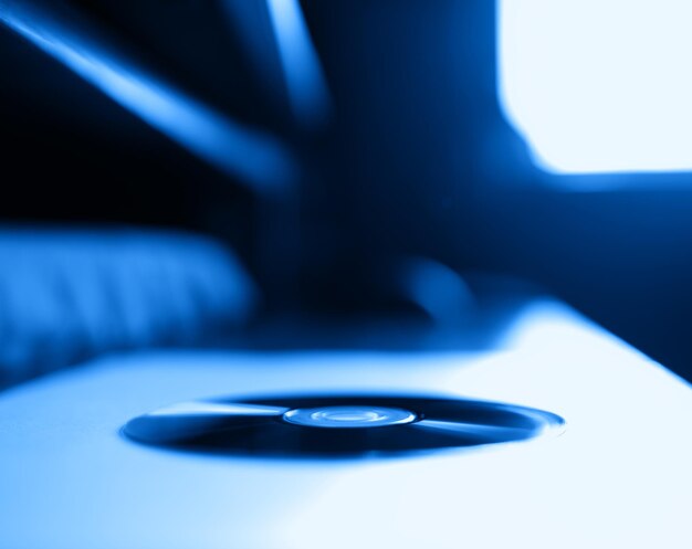 Horizontal blueray disc on table bokeh background hd