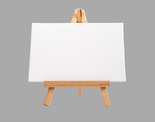 Horizontal canvas mockup blank paper on wood easel on gray background